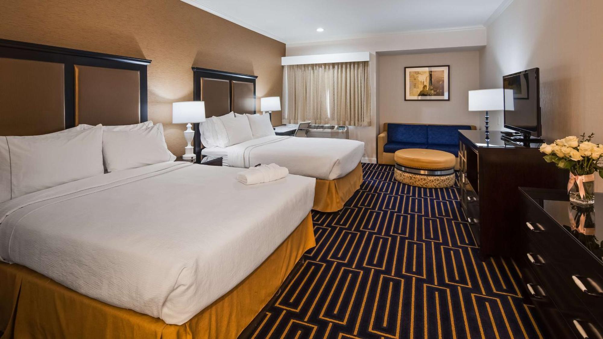 Best Western Plus Palm Court Hotel Davis Bagian luar foto